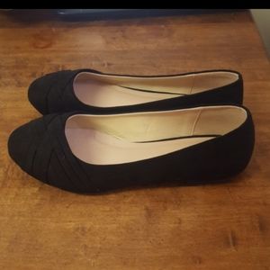 Black ballet flats.